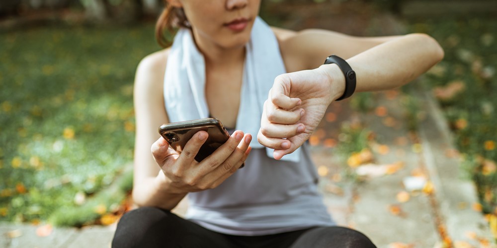 woman using a fitness app